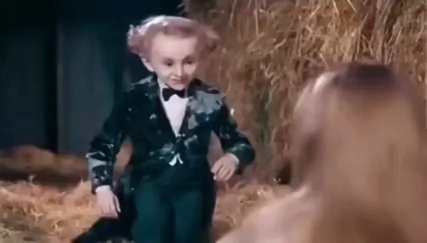 AI Rumpelstiltskin video: a tiny imp in a sequin jacket tiptoes through the straw barn